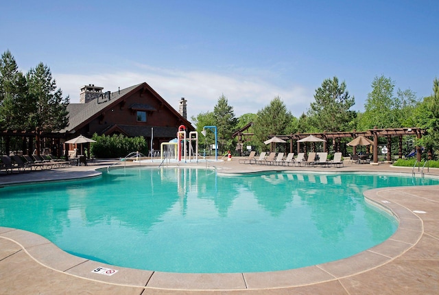 pool featuring a patio