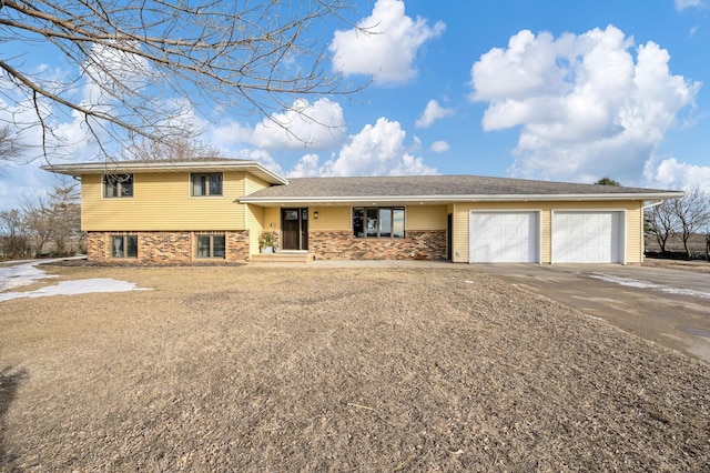 split level home with a garage