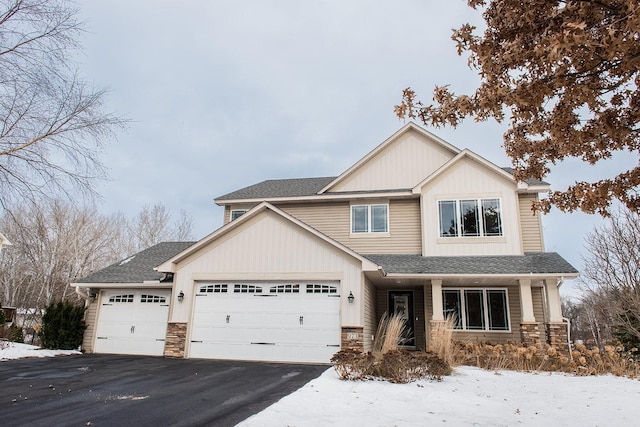 craftsman inspired home featuring a garage