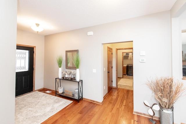 entrance foyer with light hardwood / wood-style floors