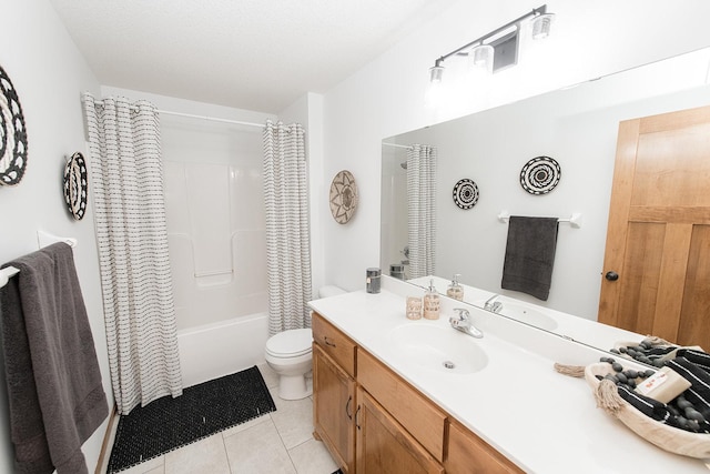 full bathroom featuring toilet, vanity, shower / tub combo, and tile patterned floors