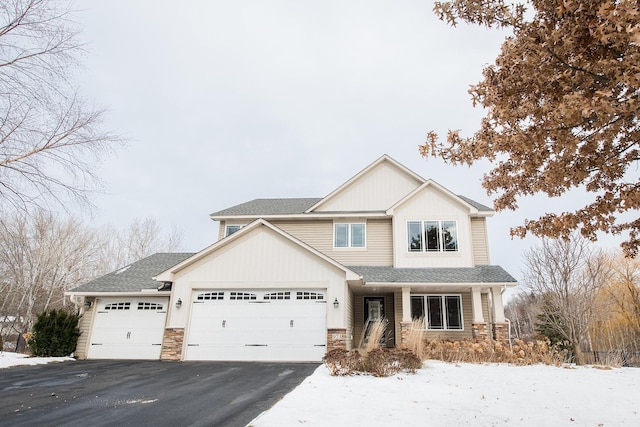 craftsman house featuring a garage