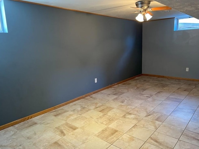 unfurnished room with ceiling fan