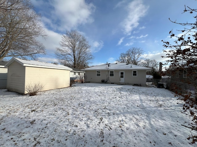 view of snow covered house