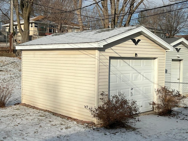 view of snow covered garage