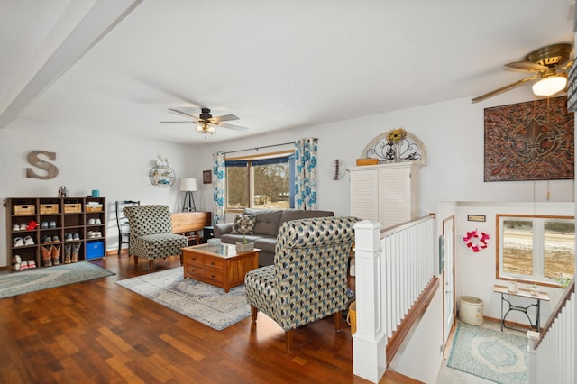 living room with hardwood / wood-style flooring and ceiling fan