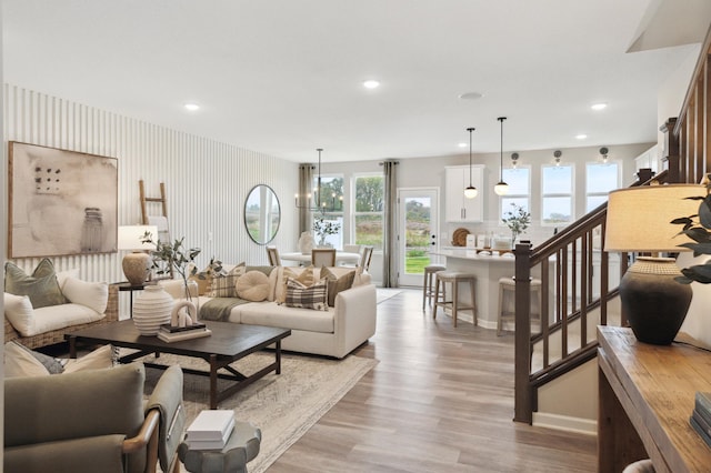 living room with light hardwood / wood-style floors