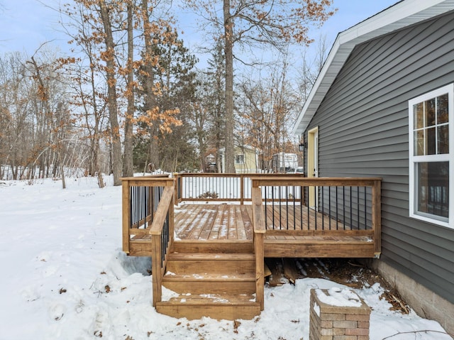 view of snow covered deck