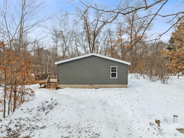 exterior space with a wooden deck