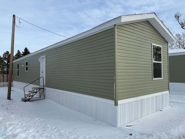 view of snow covered property