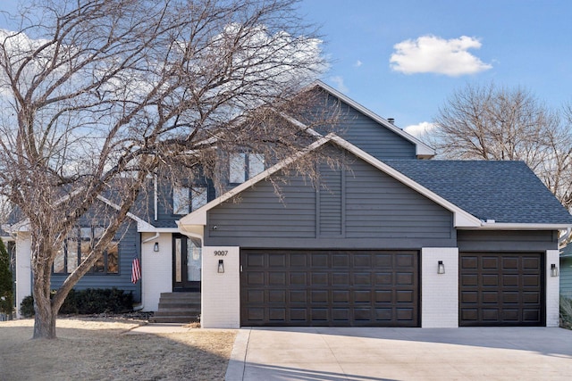 view of front of home with a garage