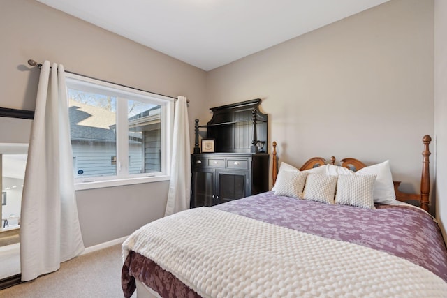 bedroom featuring carpet