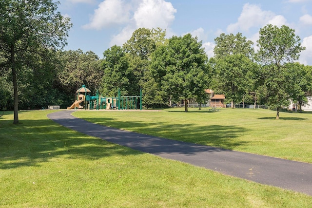 view of community featuring a yard and a playground