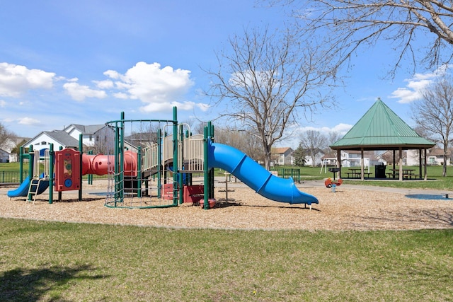 view of jungle gym featuring a gazebo and a lawn