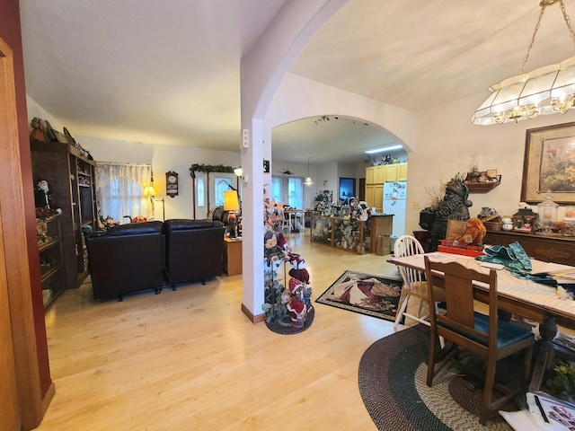 dining room with light wood-type flooring