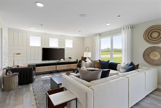 living room featuring recessed lighting and wood finished floors