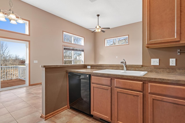 kitchen with ceiling fan with notable chandelier, black dishwasher, sink, kitchen peninsula, and light tile patterned floors