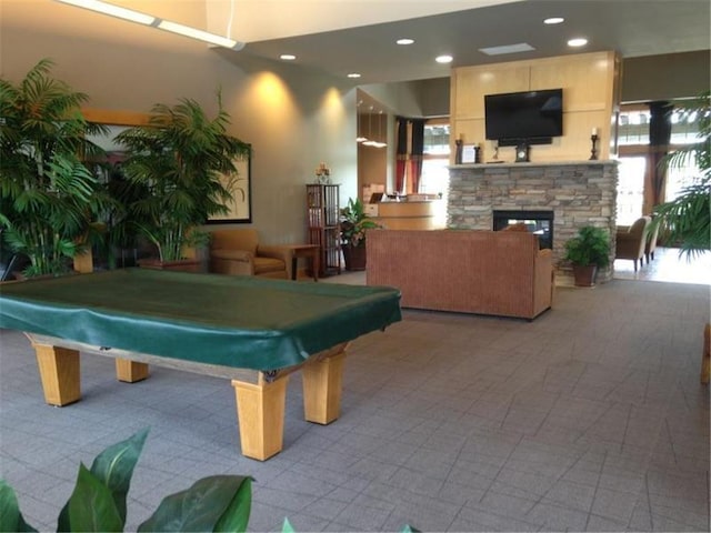 game room featuring pool table, a fireplace, and recessed lighting