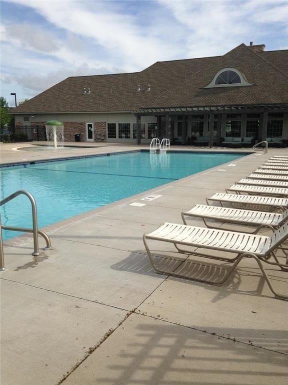 pool featuring a patio area