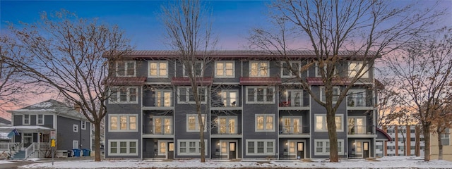 view of snow covered property