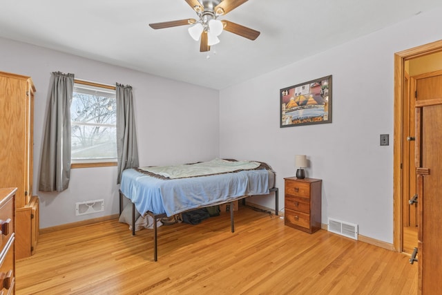 bedroom featuring ceiling fan and light hardwood / wood-style floors