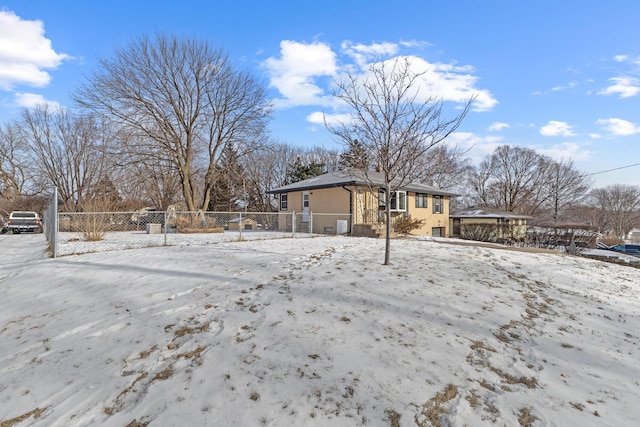 view of yard covered in snow