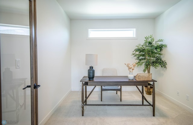 office area with light colored carpet