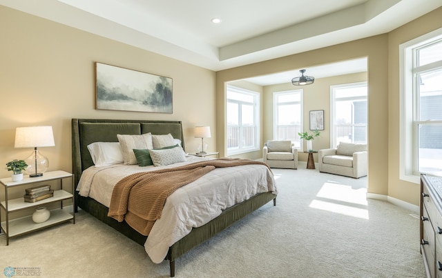 bedroom featuring baseboards, recessed lighting, and light colored carpet