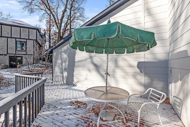 view of snow covered deck