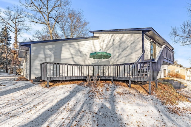 exterior space featuring a wooden deck