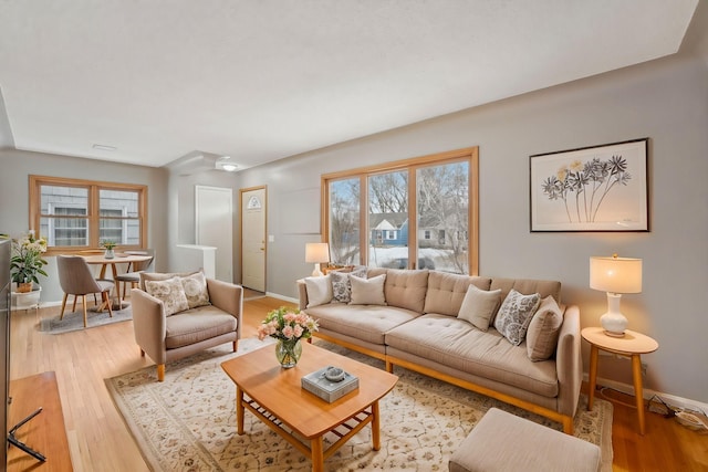 living room with light hardwood / wood-style flooring