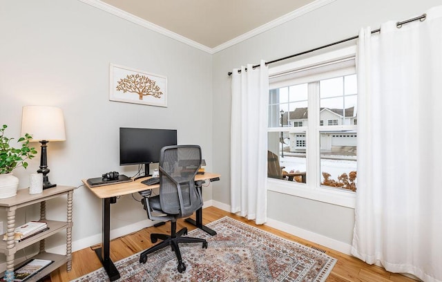 office space with ornamental molding and hardwood / wood-style flooring