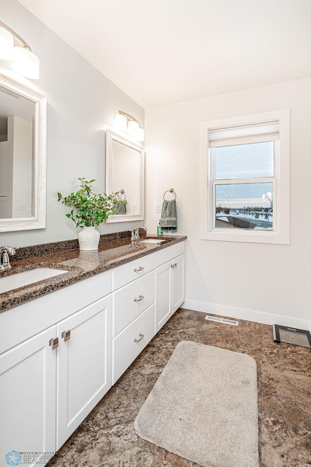 bathroom featuring vanity