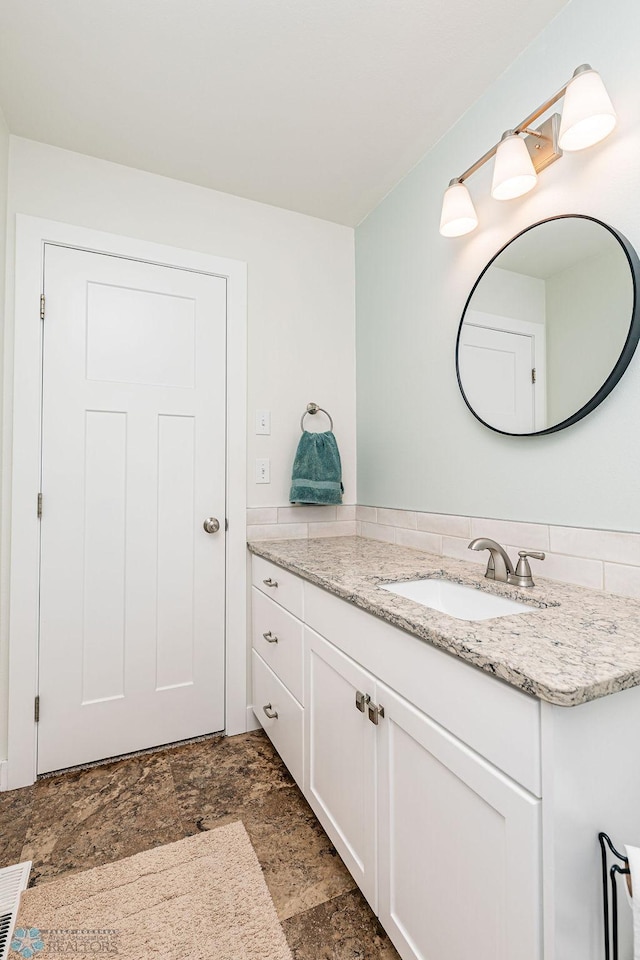 bathroom featuring vanity