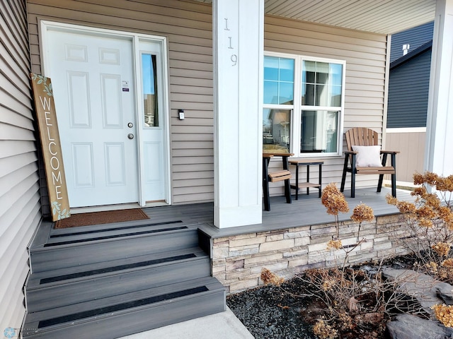 entrance to property with covered porch