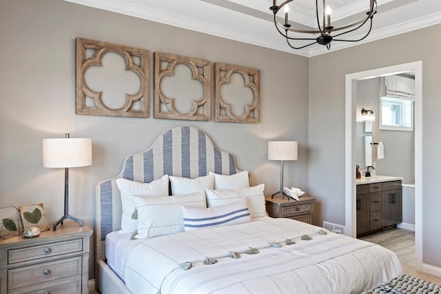 bedroom featuring ensuite bathroom, crown molding, a chandelier, and light hardwood / wood-style flooring