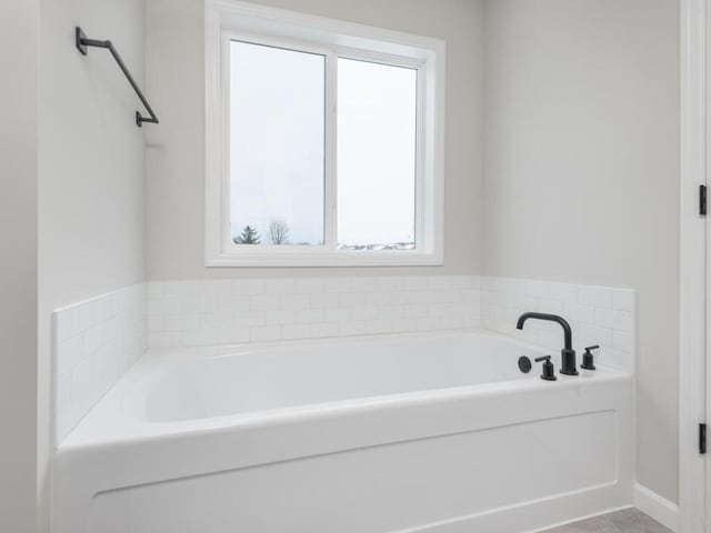 bathroom featuring a bathtub