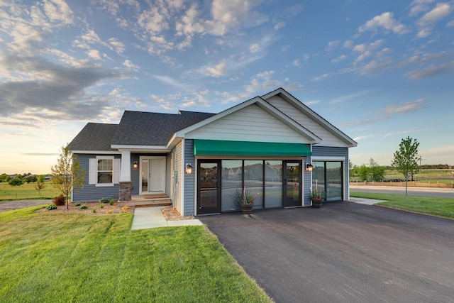 view of front of home with a front lawn