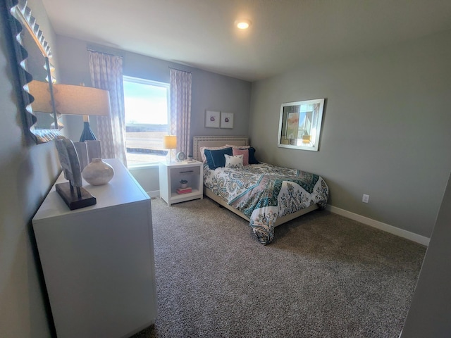 bedroom featuring carpet