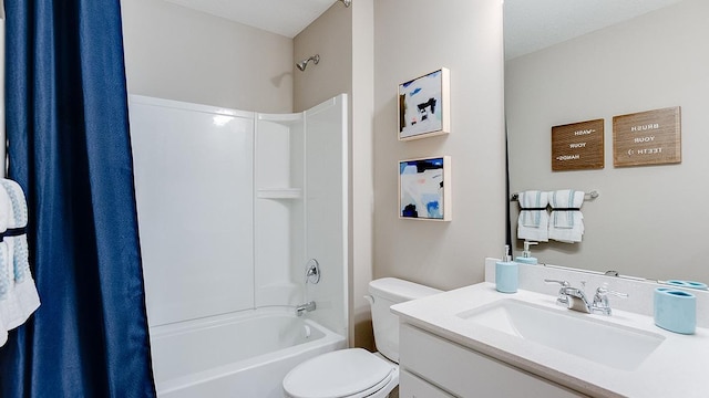 full bathroom featuring shower / bathtub combination with curtain, vanity, and toilet