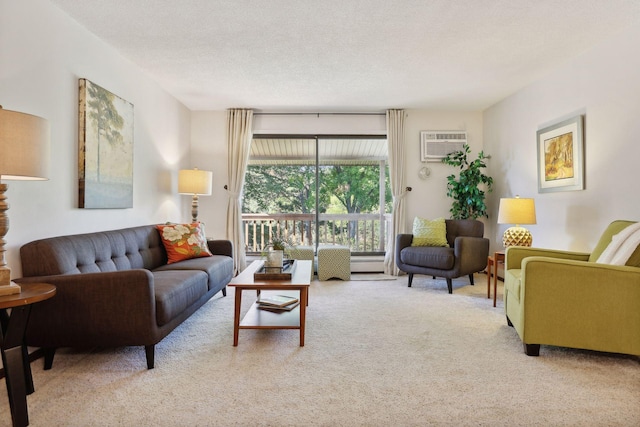 carpeted living room with a wall mounted AC and a textured ceiling