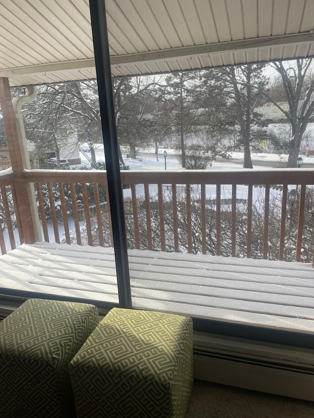 view of snow covered deck