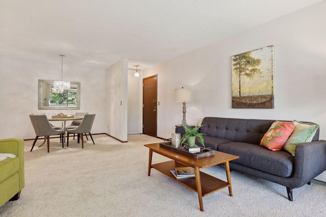 carpeted living room featuring a textured ceiling