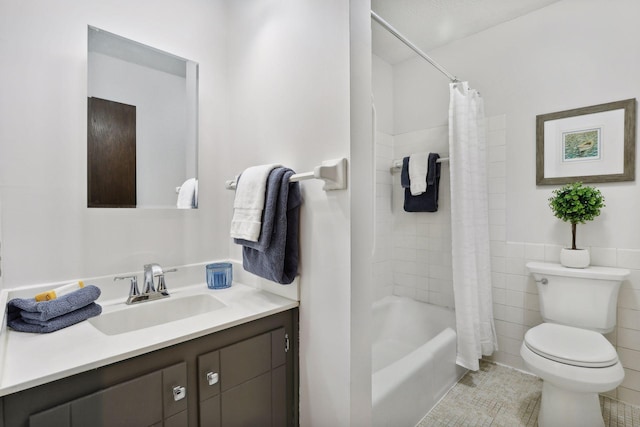 full bathroom with toilet, vanity, tile walls, tile patterned flooring, and shower / bath combination with curtain