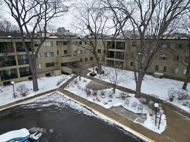 view of snow covered property