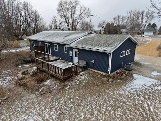 back of property featuring a wooden deck and central air condition unit