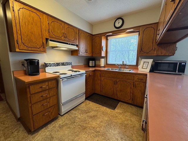 kitchen with sink, a textured ceiling, and white electric range