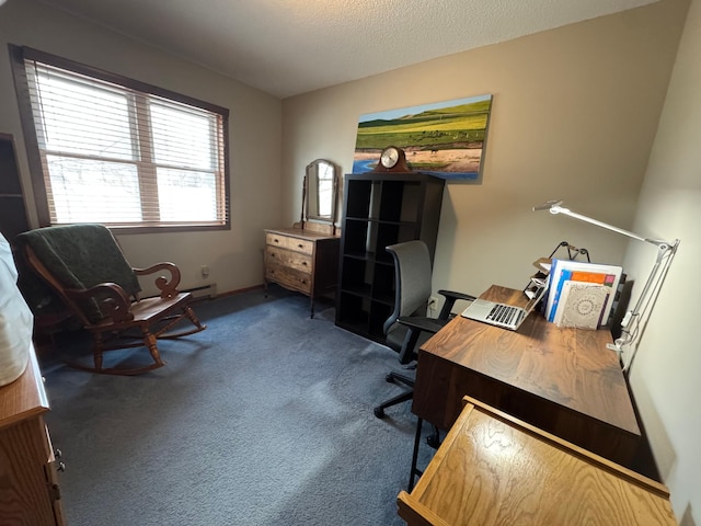 carpeted office space featuring a textured ceiling