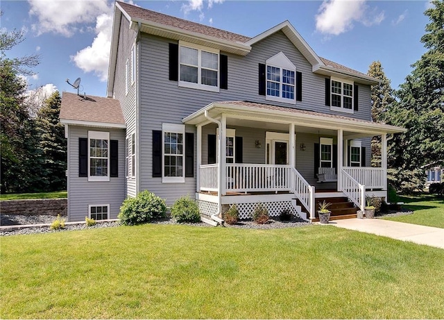 view of front of property with a front lawn and a porch