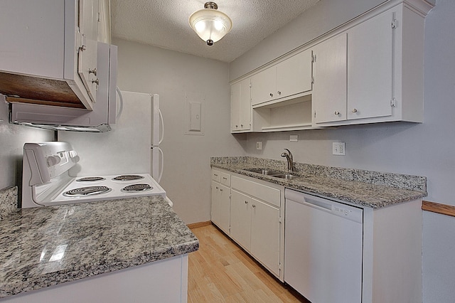 kitchen with sink, white appliances, light hardwood / wood-style floors, white cabinets, and a textured ceiling